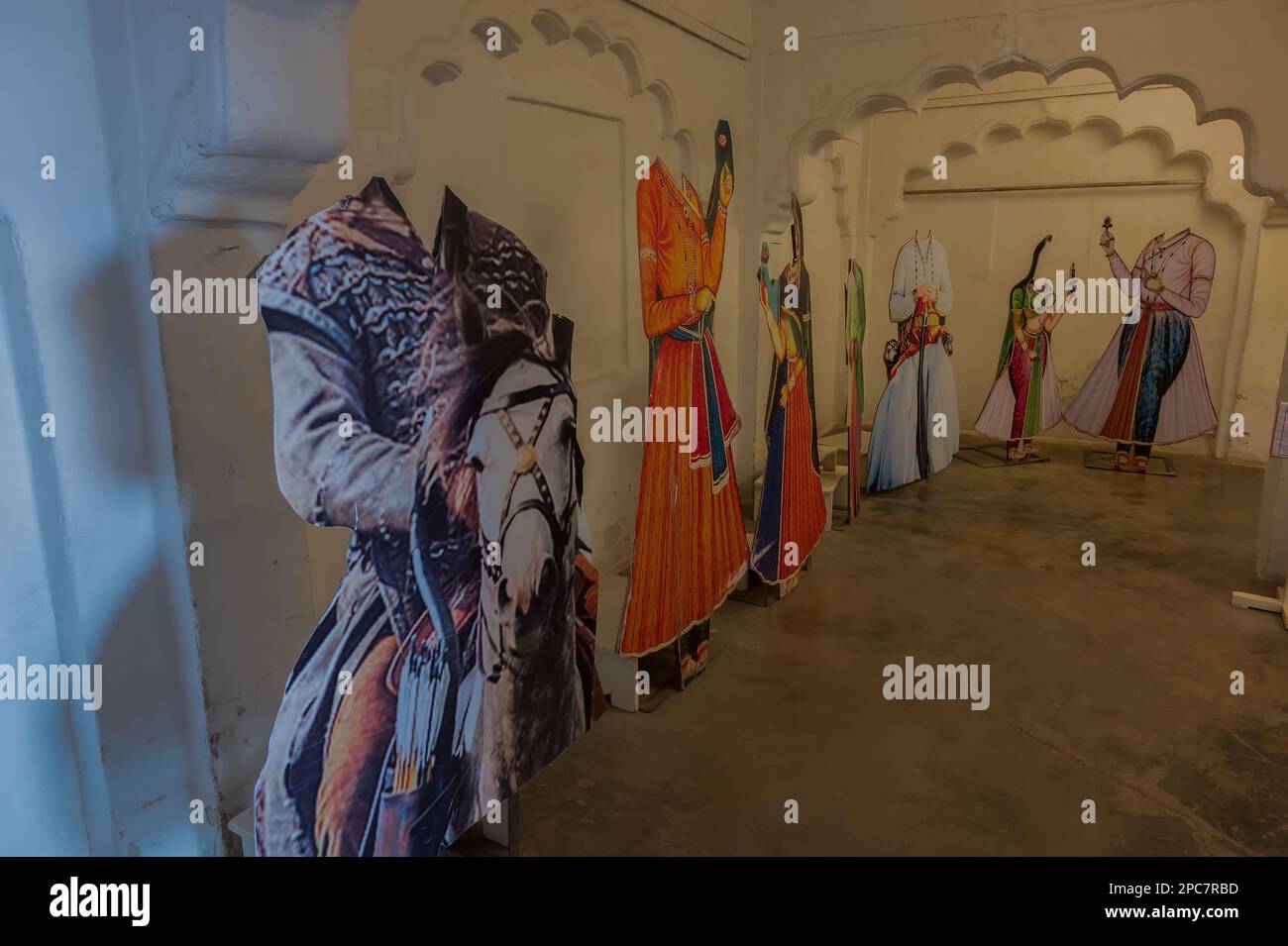 Jodhpur, Rajasthan, India - 19th October 2019 : Cut outs of designer antique dresses of Rajput Maharajas and Maharanis , preserved at Mehrangarh fort. Stock Photo
