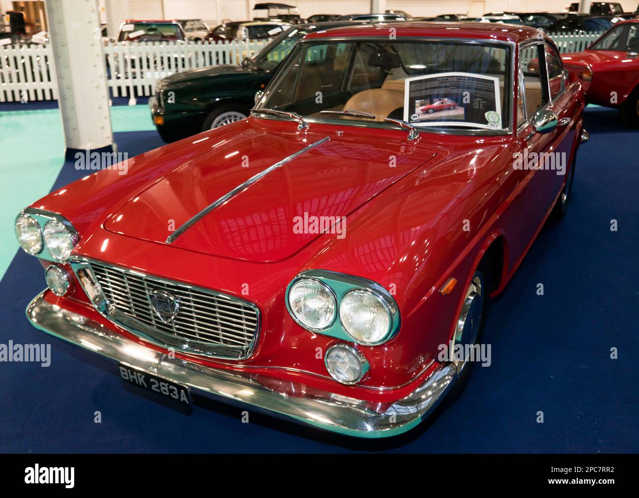 Three-quarters front view of a Red, 1963,  Lancia Flavia 1500 Coupé, on display at the 2023 London Classic Car Show Stock Photo