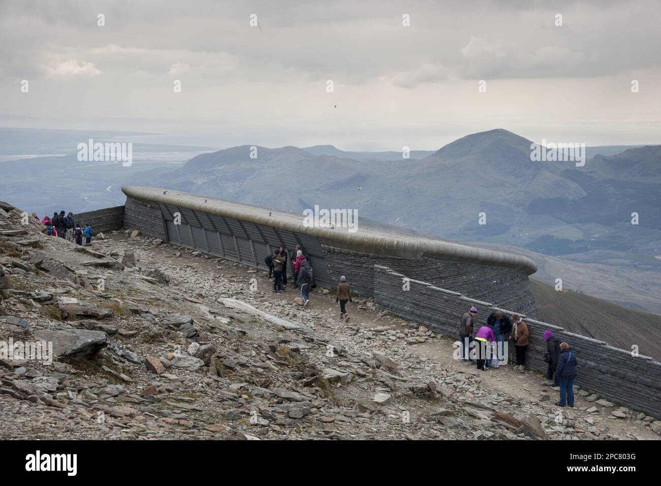 Hafod Eryri Visitor Centre and walkers on the mountain top, Snowdon, Snowdonia N. P. Gwynedd, North Wales, United Kingdom, Europe Stock Photo