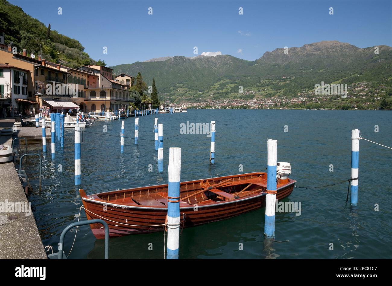 Boats in the harbour of the town on the lake island, Peschiera Maraglio, Monte Isola, Lago d'Iseo, Lombardy, Italy Stock Photo