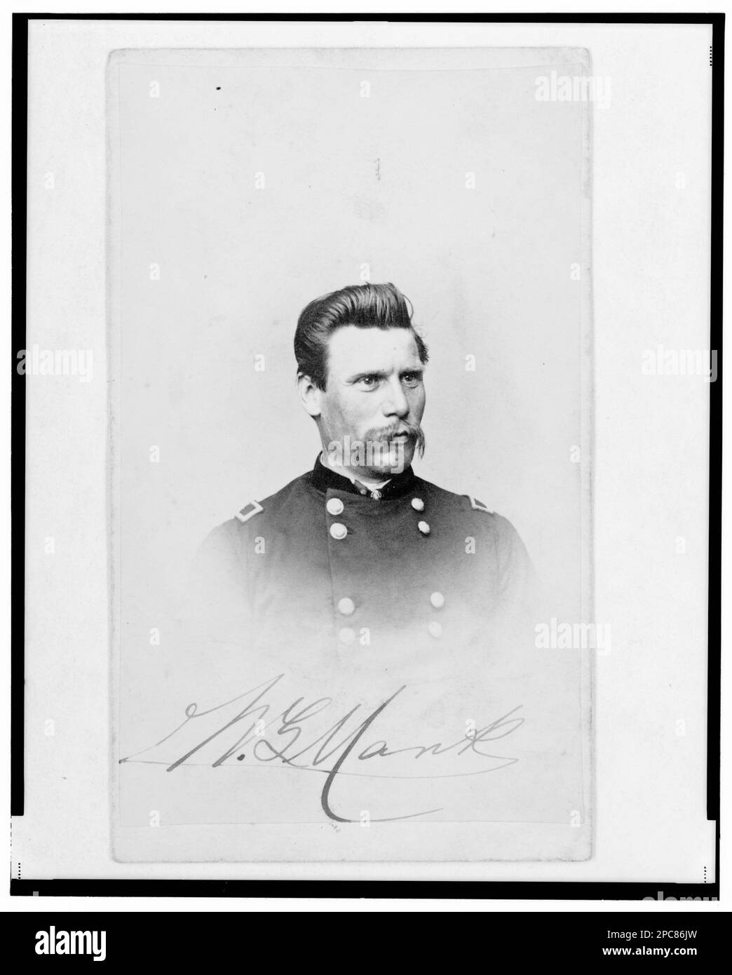 Major William G. Mank, Union officer in the 32nd Indiana Regiment, head-and-shoulders portrait, facing front / Henry Ulke, Washington, D.C.. Title devised by Library staff, In: Adolph Metzner photograph album ., no. 22, Color laser copy reference surrogate, showing front and back of photo, filed with finding aids for LOT 8751 in P&P Reading Room. Mank, William G, 1831-1887, Military service, United States, Army, Indiana Infantry Regiment, 32nd (1861-1865), People, United States, History, Civil War, 1861-1865, Military officers, Union. Stock Photo