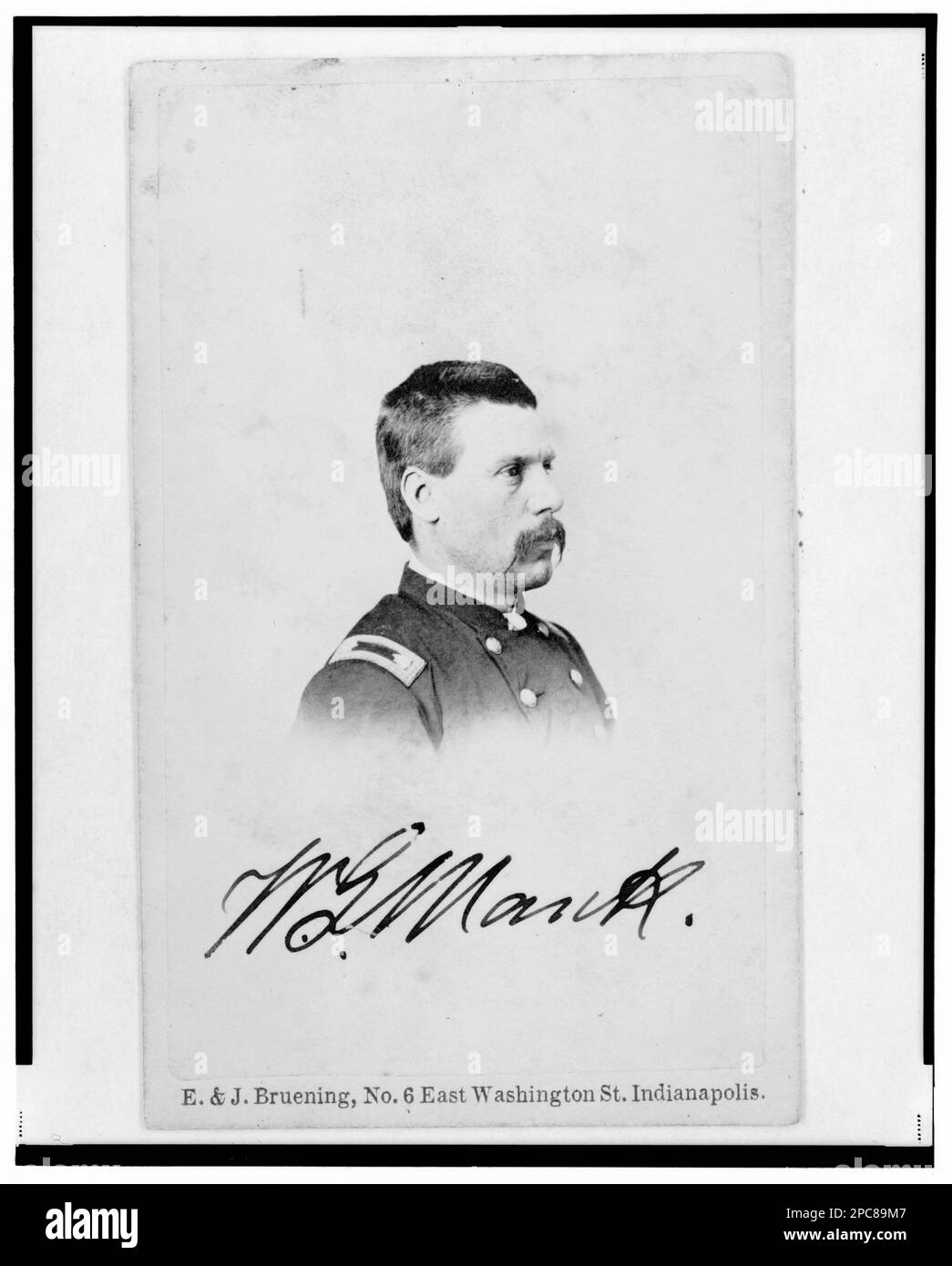 Brigadier General William G. Mank, Union officer in the 32nd Indiana Regiment, head-and-shoulders portrait, turned right / E. & J. Bruening, Indianapolis.. Title devised by Library staff, In: Adolph Metzner photograph album ., no. 21, Color laser copy reference surrogate, showing front and back of photo, filed with finding aids for LOT 8751 in P&P Reading Room. Mank, William G, 1831-1887, Military service, United States, Army, Indiana Infantry Regiment, 32nd (1861-1865), People, United States, History, Civil War, 1861-1865, Military officers, Union. Stock Photo