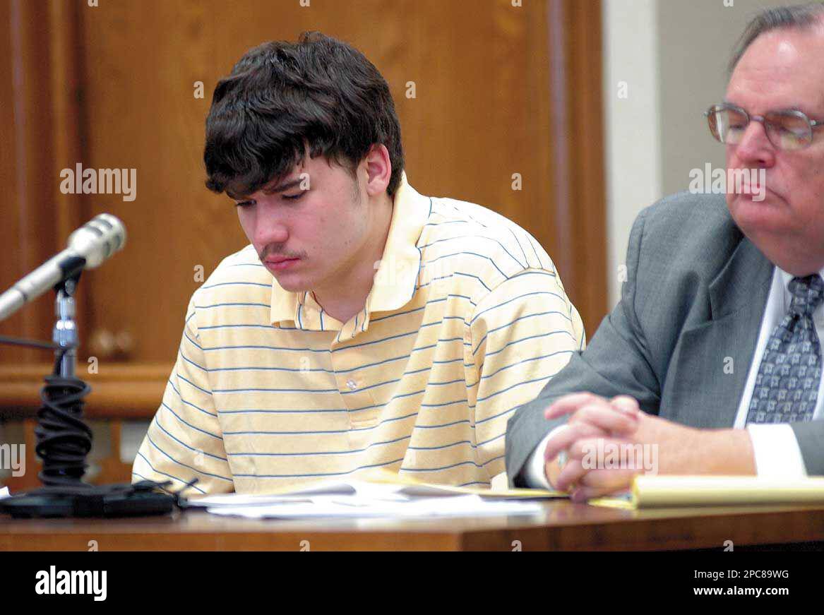 Christopher Tindall, 17, left, and his attorney Marc Triplett listen to
