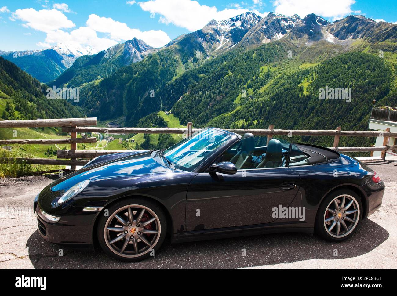 Porsche 911 997 4s cabriolet in the Alps, roof open, sports car, sporty car, Tyrol, Austria, Europe, High Alpine Road Stock Photo