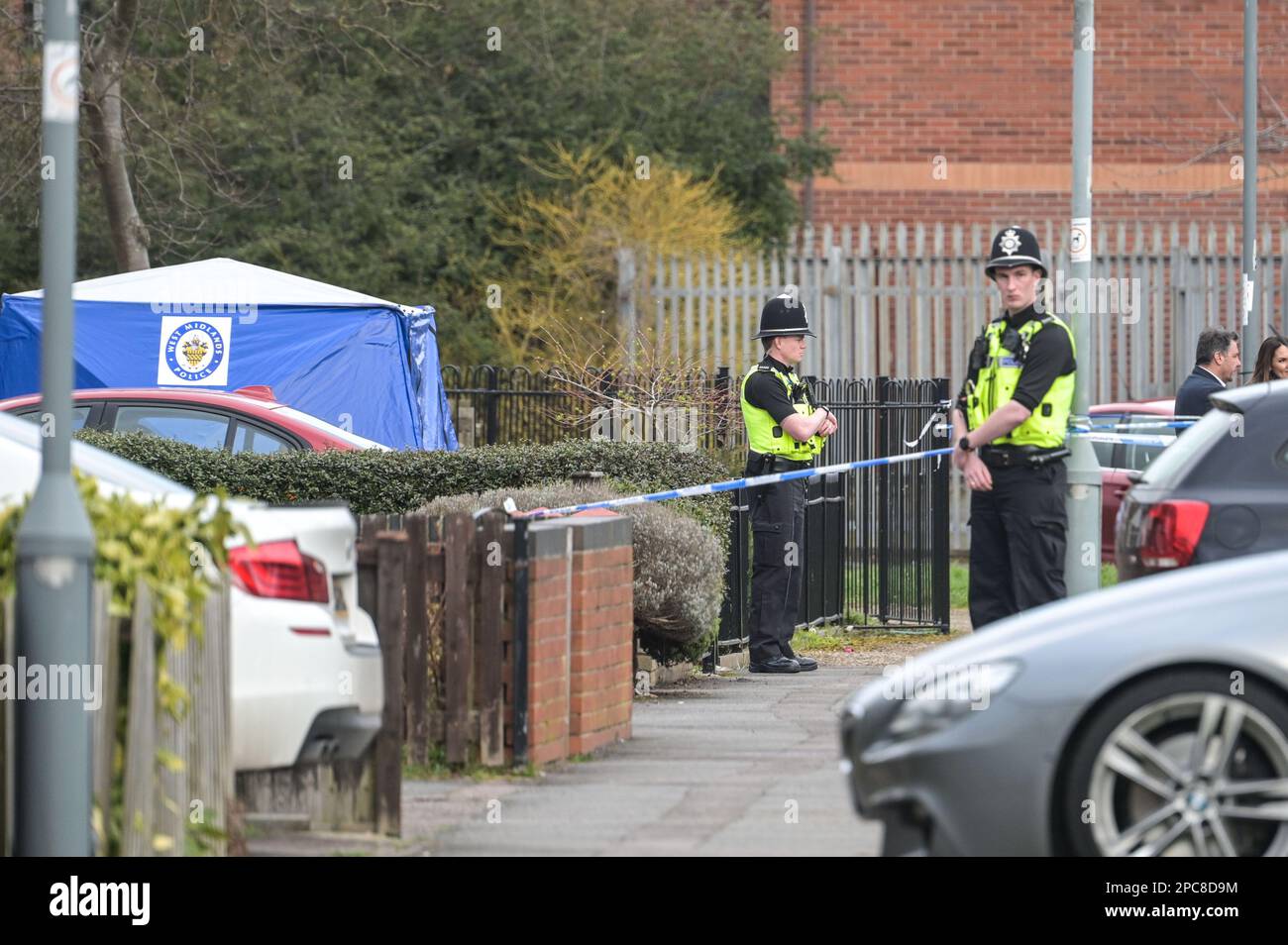 Cadbury Drive, Birmingham, 13th March 2023 -West Midlands Police have launched a murder investigation after two men were attacked at a property in Birmingham this afternoon. A blue forensic trent was outside the property with 2 forensic officers taking pictures. One man suffered stab wounds and, despite the best efforts of ambulance colleagues, died at the scene in Cadbury Drive just after 1pm. Another man also suffered stab wounds and has been taken to hospital in a critical condition. Credit: Katie Stewart/Alamy Live News Stock Photo