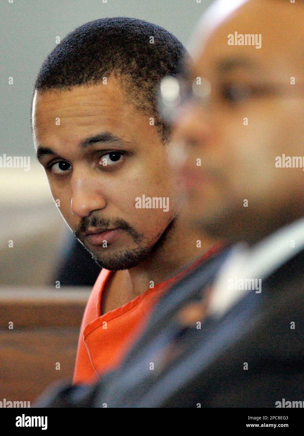 Mikal Deen Mahdi, 23, of Virginia, looks across at his lawyers during his  sentencing phase of his trial Monday, Dec.4, 2006, in St. Matthews, S.C.  Mahdi pleaded guilty to murder and other