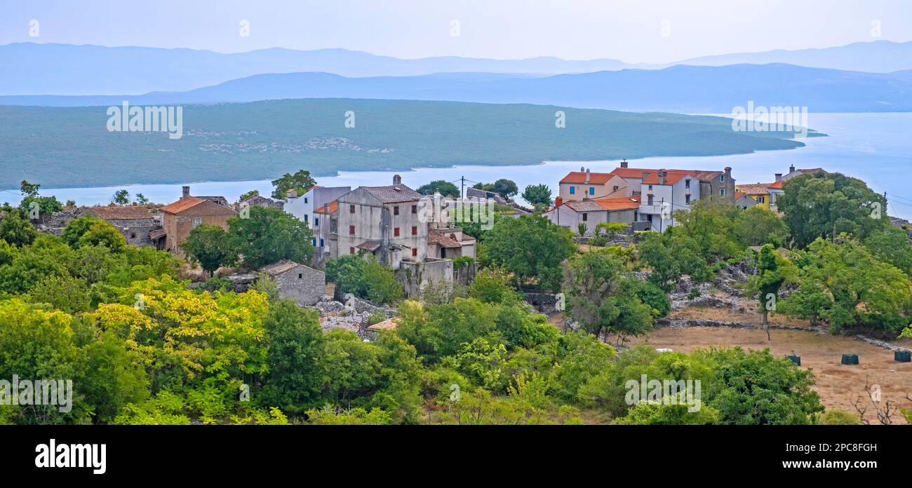 View over old houses on the island Cres and Krk in the Kvarner Bay and the mainland, Primorje-Gorski Kotar County, Croatia Stock Photo