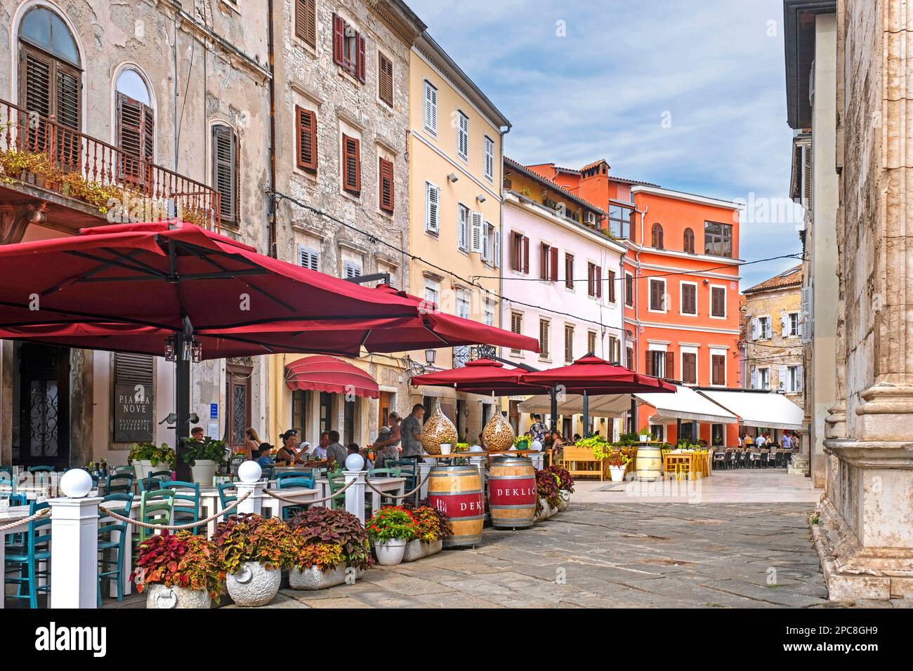 Alley with terraces of restaurants in the historic town centre of the city Pula / Pola, Istria County, Croatia Stock Photo