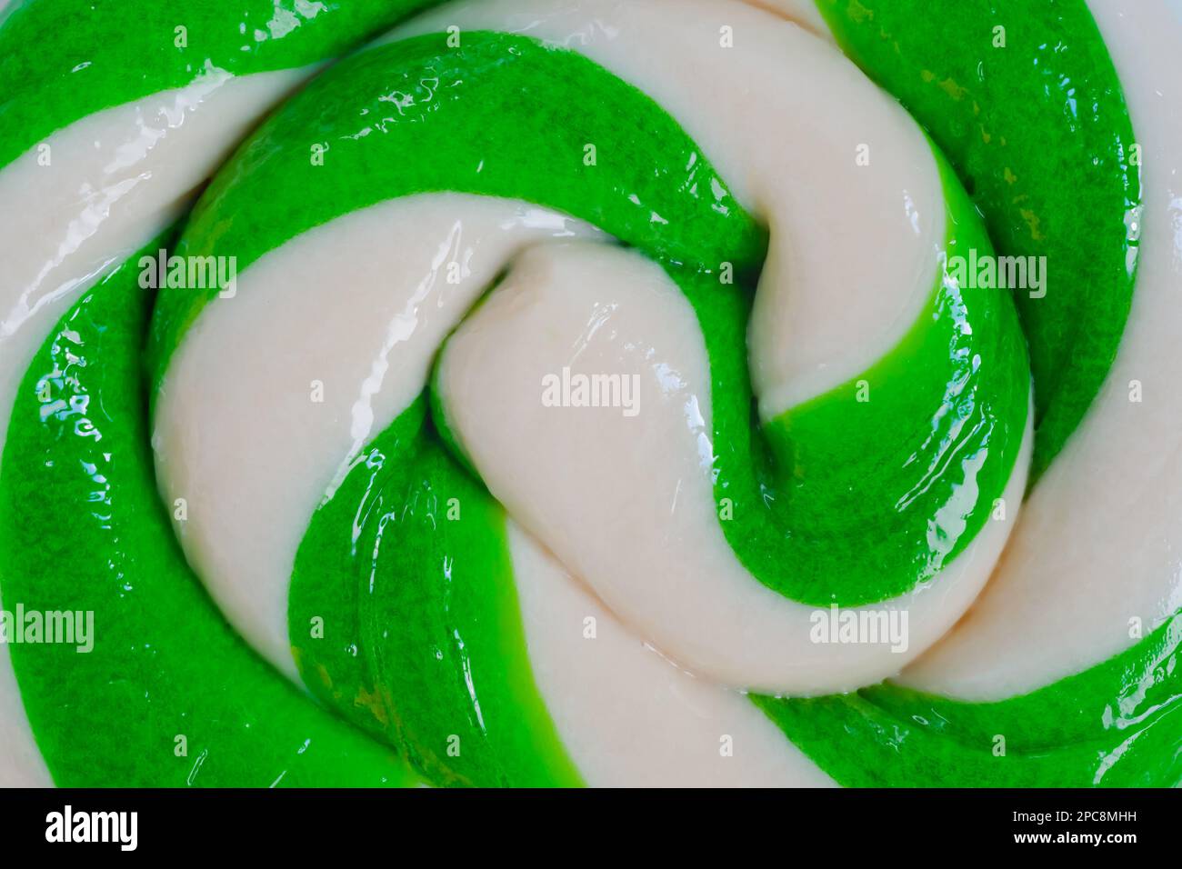 Top view: green and white large spiral candy lollipop - close up Stock ...