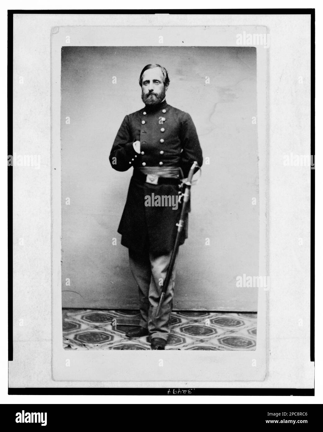 Major Sidney Coolidge, U.S.A., in uniform, full-length portrait, facing front. Title devised by Library staff, Written on verso: Major Sidney Coolidge, 16th U.S. Inf, killed at Chickamauga, Sept. 19th, 1863, Reference copy in BIOG FILE, Gift; Laurence Gouverneur Hoes; 1957 Jan. 24. Coolidge, Sidney, Military service, 1860-1870, Military officers, Union, 1860-1870, United States, History, Civil War, 1861-1865, Military personnel, Union. Stock Photo