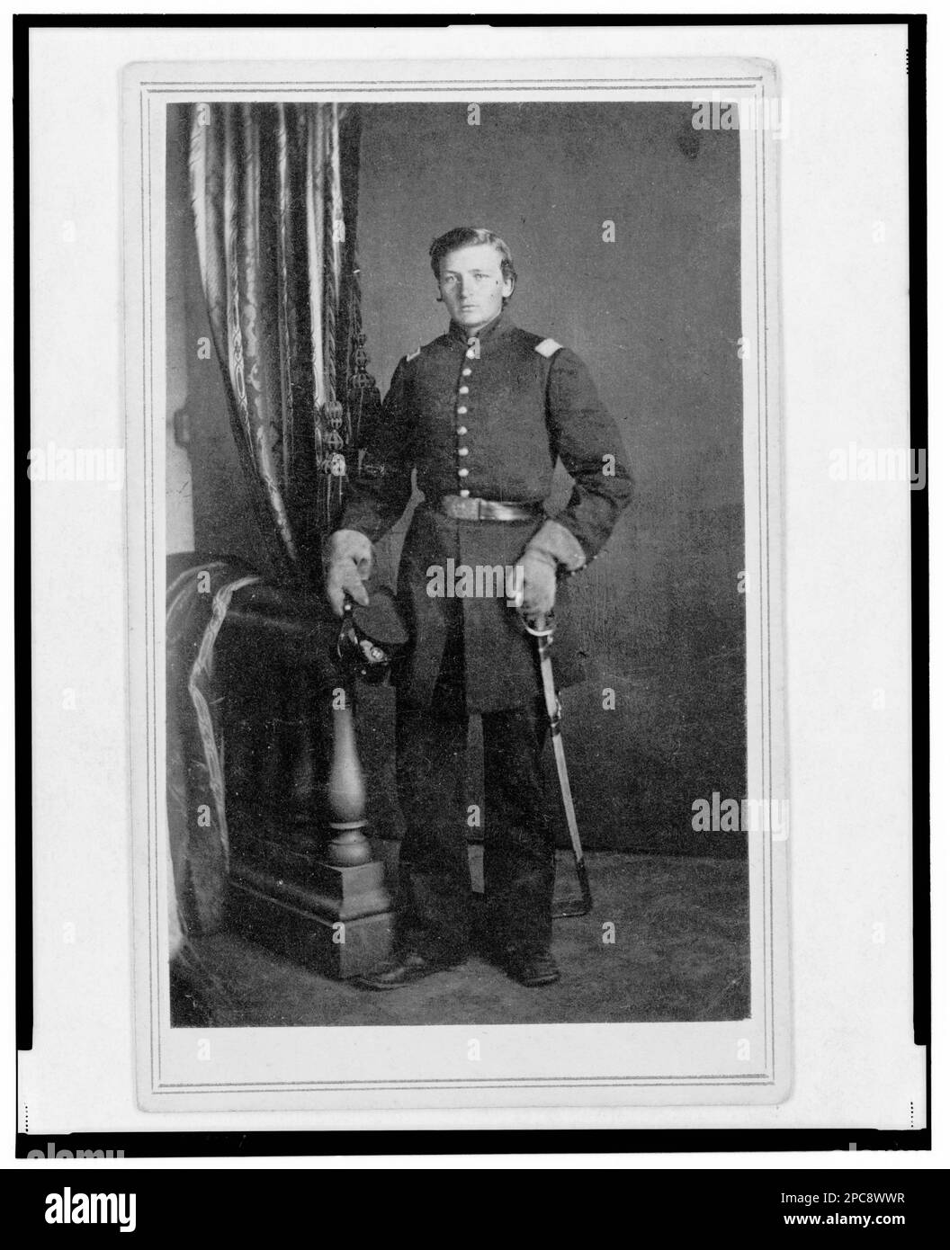 Captain Charles Nagel, Union officer in the 32nd Indiana Regiment, full-length portrait, standing, facing front / T.M. Schleier's Cartes de Visite Photograph Gallery, Nashville, Tenn.. Title devised by Library staff, In: Adolph Metzner photograph album ., no. 31, Color laser copy reference surrogate, showing front and back of photo, filed with finding aids for LOT 8751 in P&P Reading Room. Nagel, Charles, d. 1897, Military service, United States, Army, Indiana Infantry Regiment, 32nd (1861-1865), People, UnifForms, 1860-1870, United States, History, Civil War, 1861-1865, Military officers, Uni Stock Photo