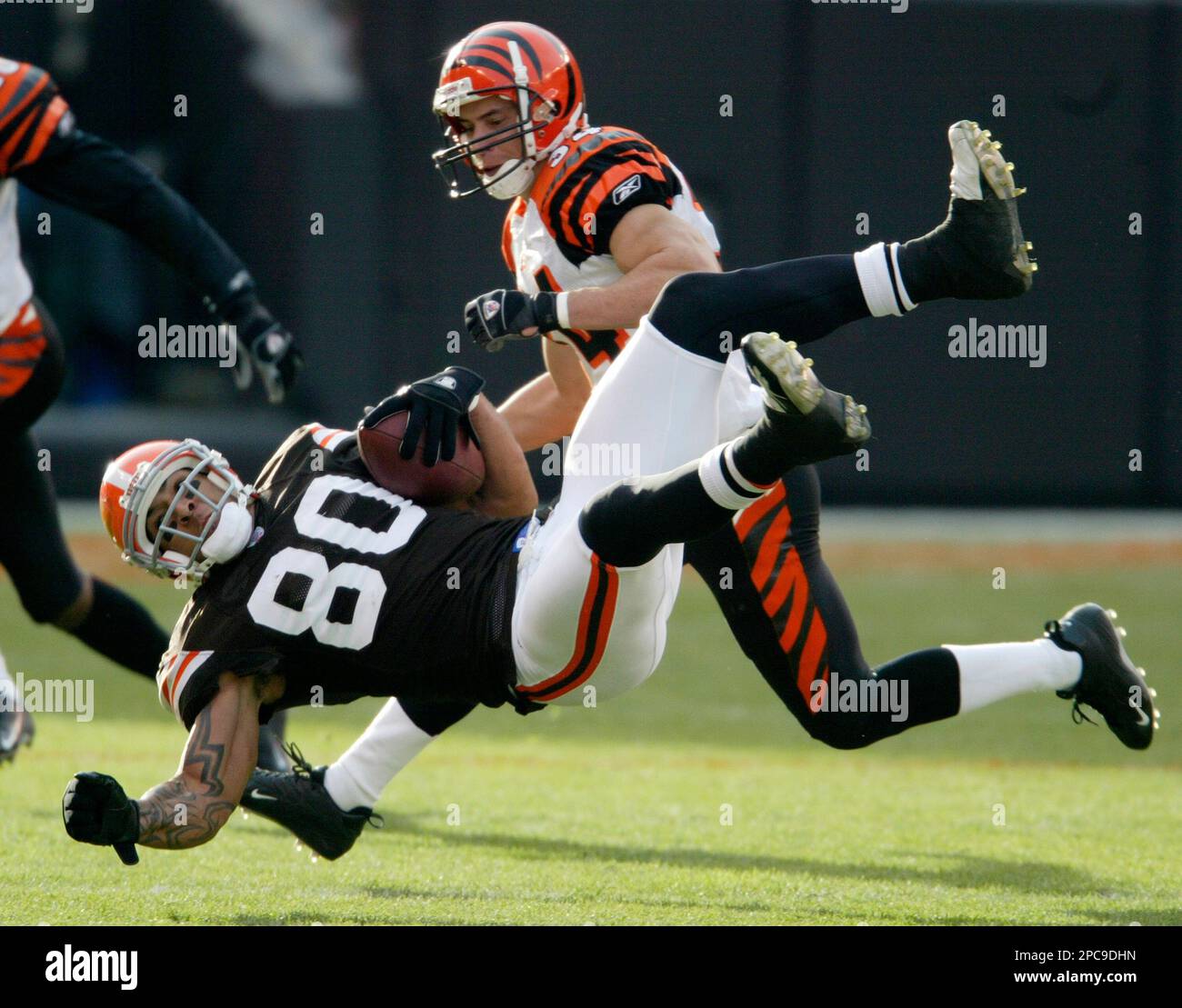 Cleveland Browns tight end Kellen Winslow Jr. (80) is upended after a  5-yard reception during third-quarter action against the Cincinnati Bengals  in their NFL football game in Cleveland on Sunday, Nov. 26,