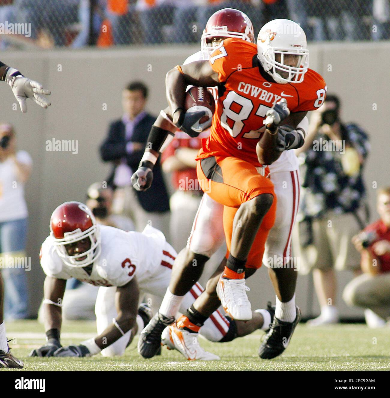 Oklahoma defensive back Reggie Smith smiles as he heads out to join his team  practicing for the Fiesta Bowl Wednesday, Dec. 27, 2006 in Phoenix.  Oklahoma will face Boise State Jan. 1