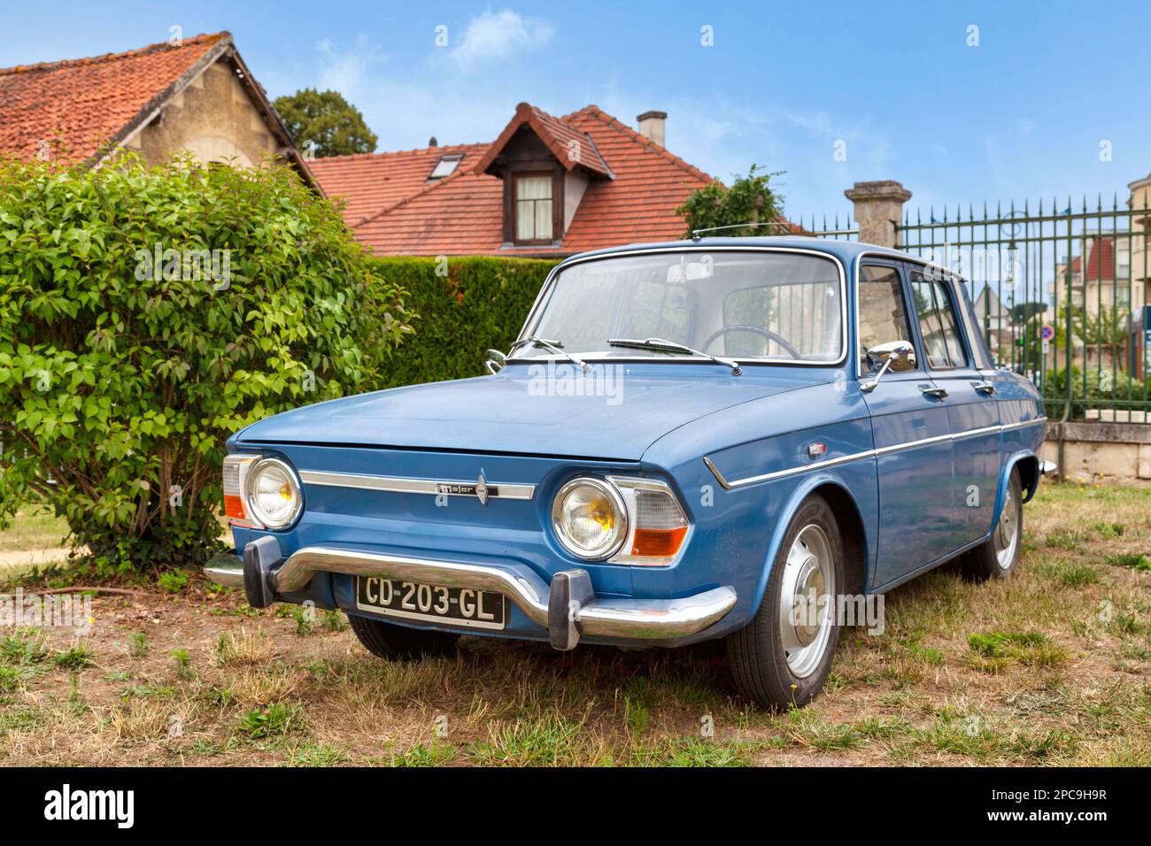 Lamorlaye, France - July 05 2020: Old Renault 10 Major parked by a bush ...