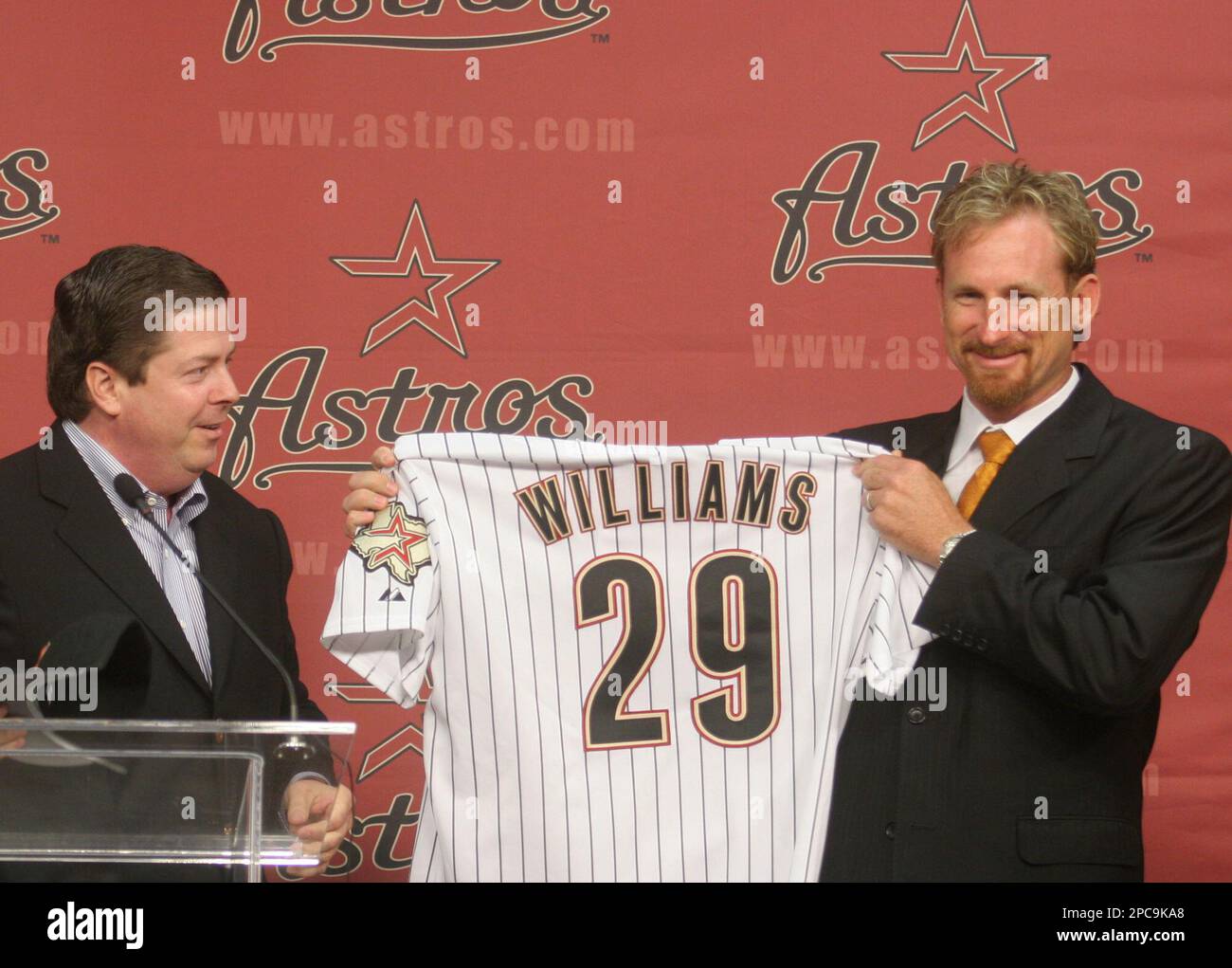 Houston Astros pitcher Woody Williams holds his jersey after