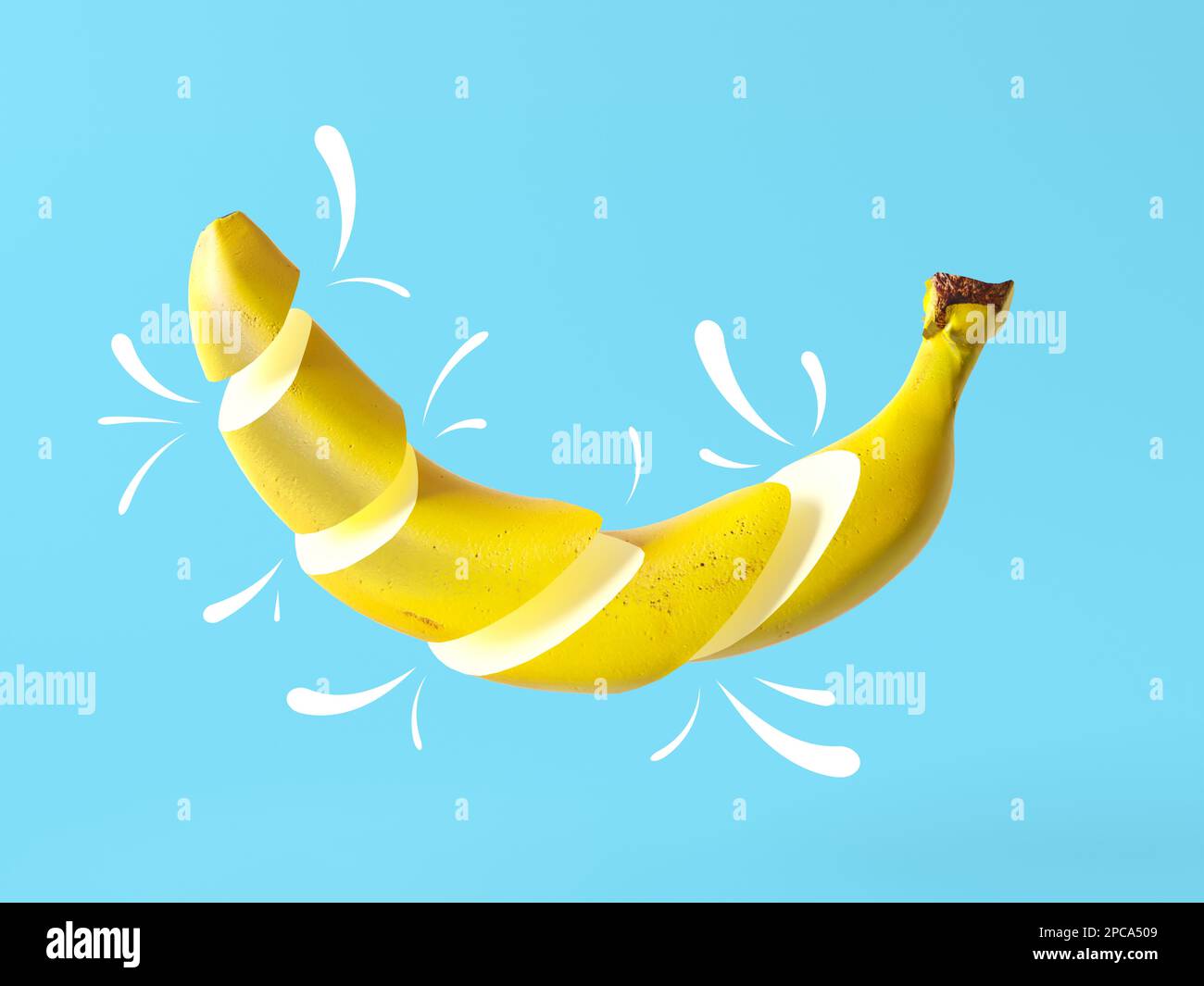 One sliced banana isolated on blue background. Floating tasty ripe yellow banana parts with cartoon comic juice drops. Fresh creative fruit for promo Stock Photo