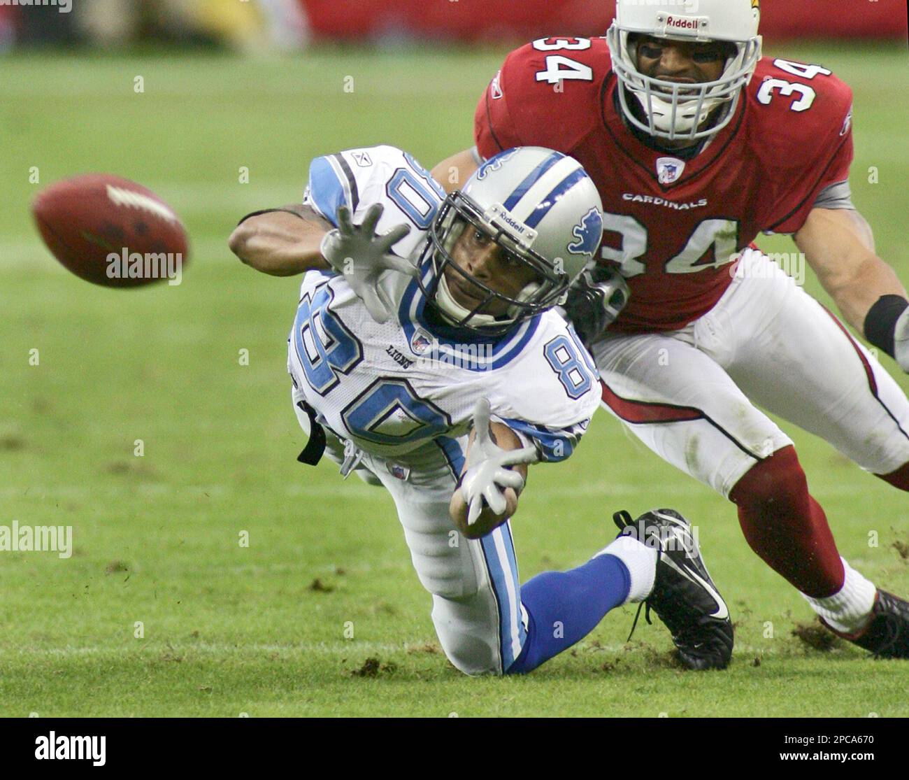 Arizona Cardinals Robert Griffith (34) watches as Detroit Lions' Devale  Ellis (80) tries to pull in a pass during the second quarter of their  football game Sunday, Nov. 19, 2006 in Glendale,