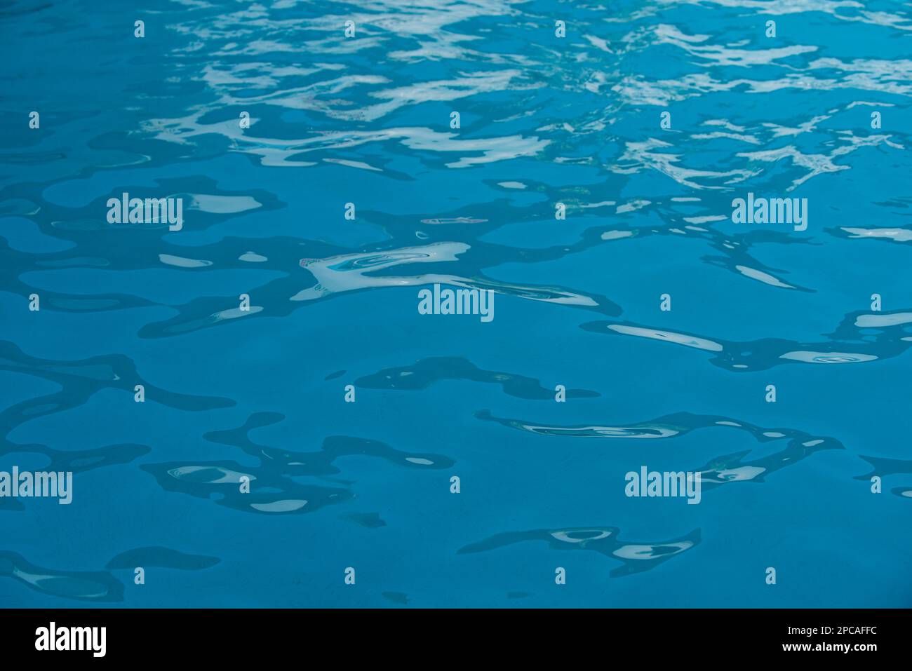 Water Ripped Over Lay Ripped water in swimming pool. Surface of blue swimming pool ...
