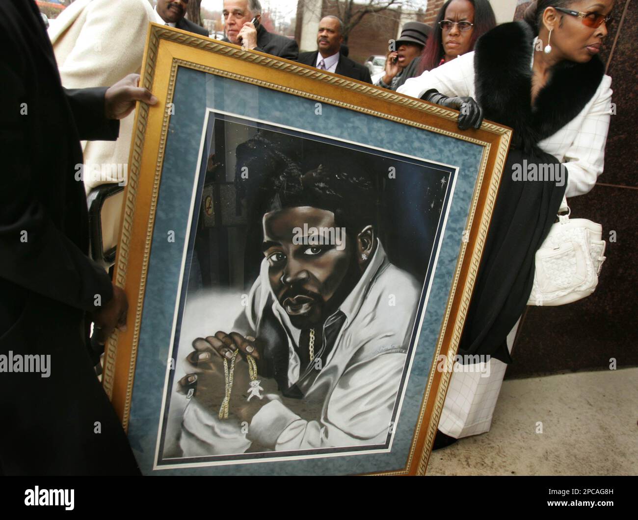 A portrait of Gerald Levert is carried out after a memorial service for