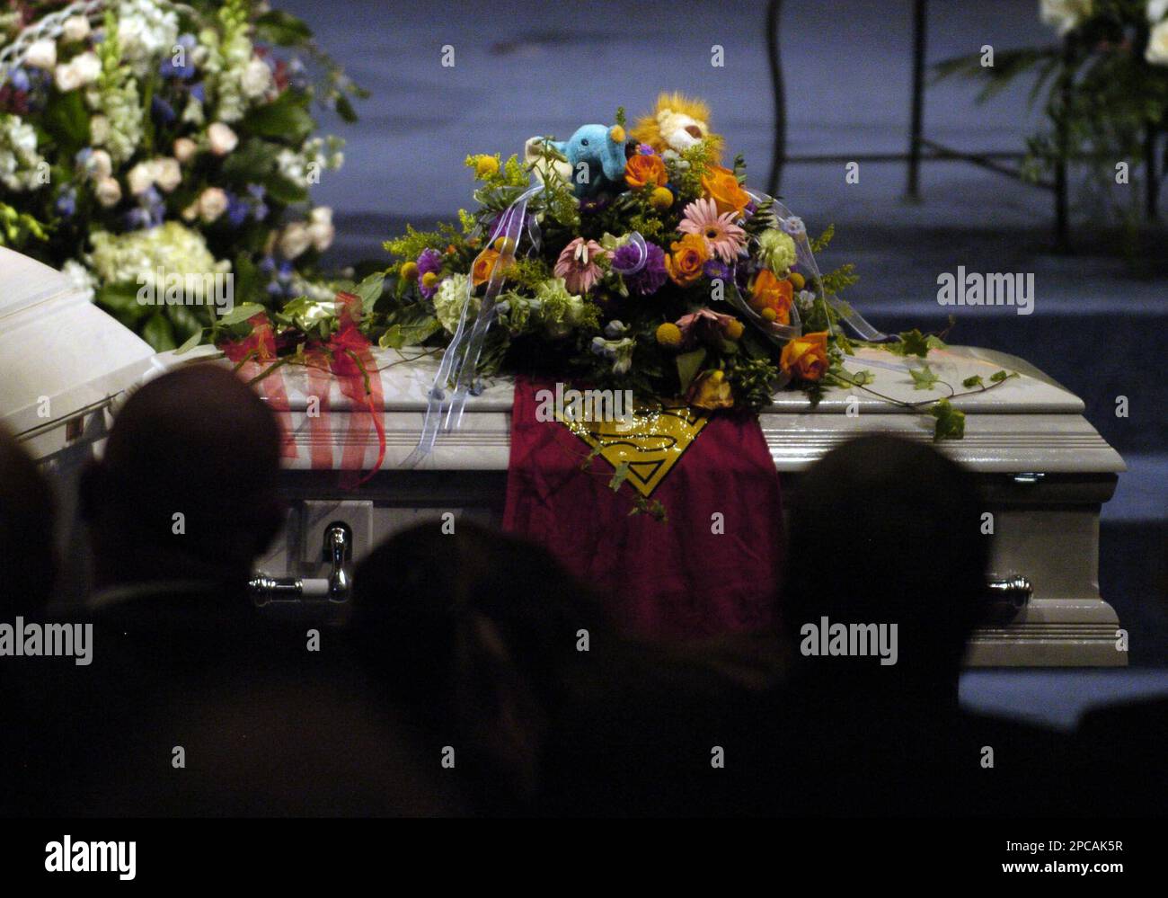 The casket of 2-year-old Garrison Bingham is covered by superman cover ...