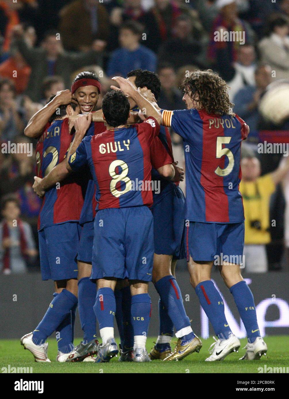 FC Barcelona player Javier Saviola, left, celebrates his goal