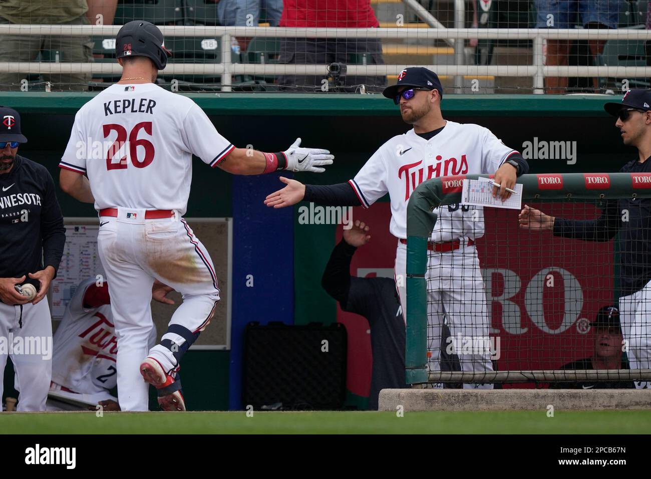 Minnesota Twins Max Kepler (26) is greeted at the dugout on his solo ...