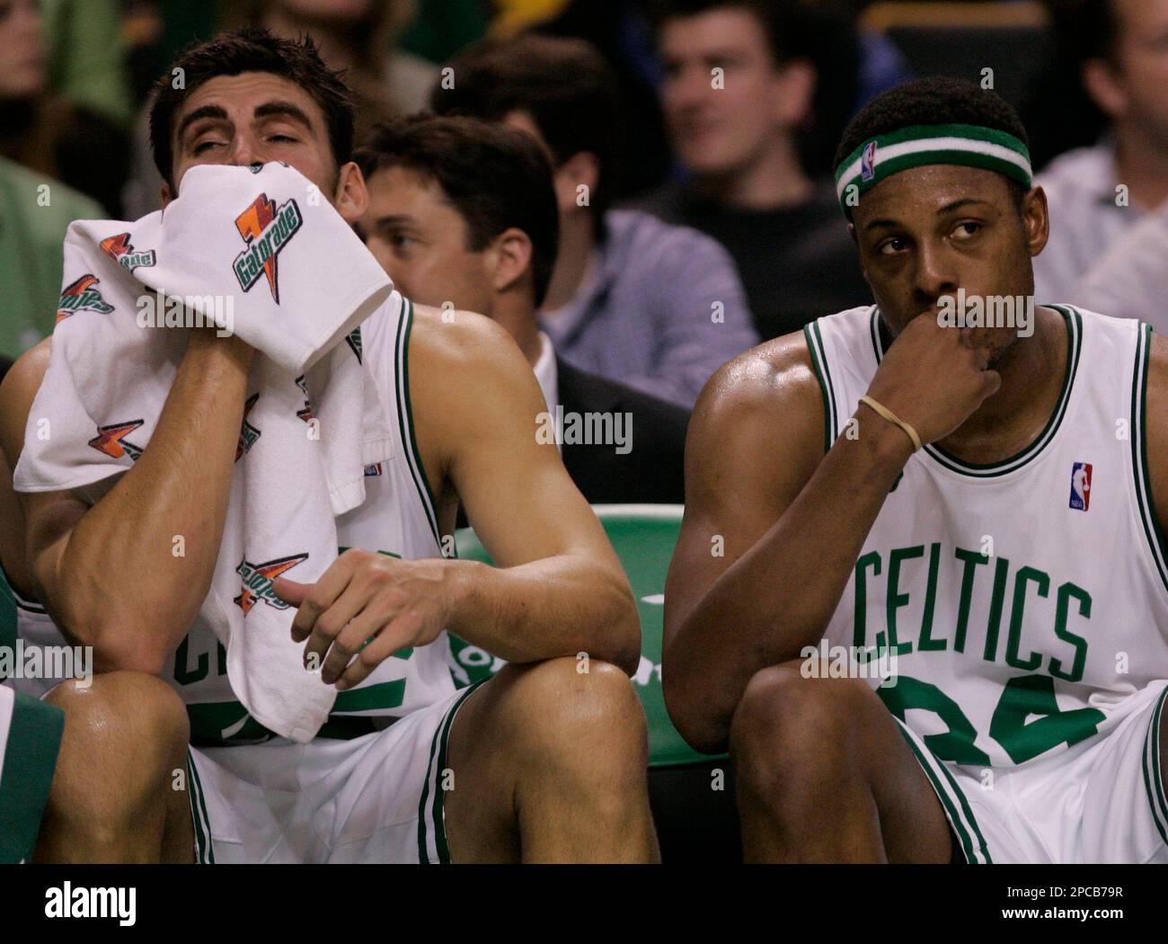 Boston Celtics forwards Paul Pierce, right, and Wally Szczerbiak sit on
