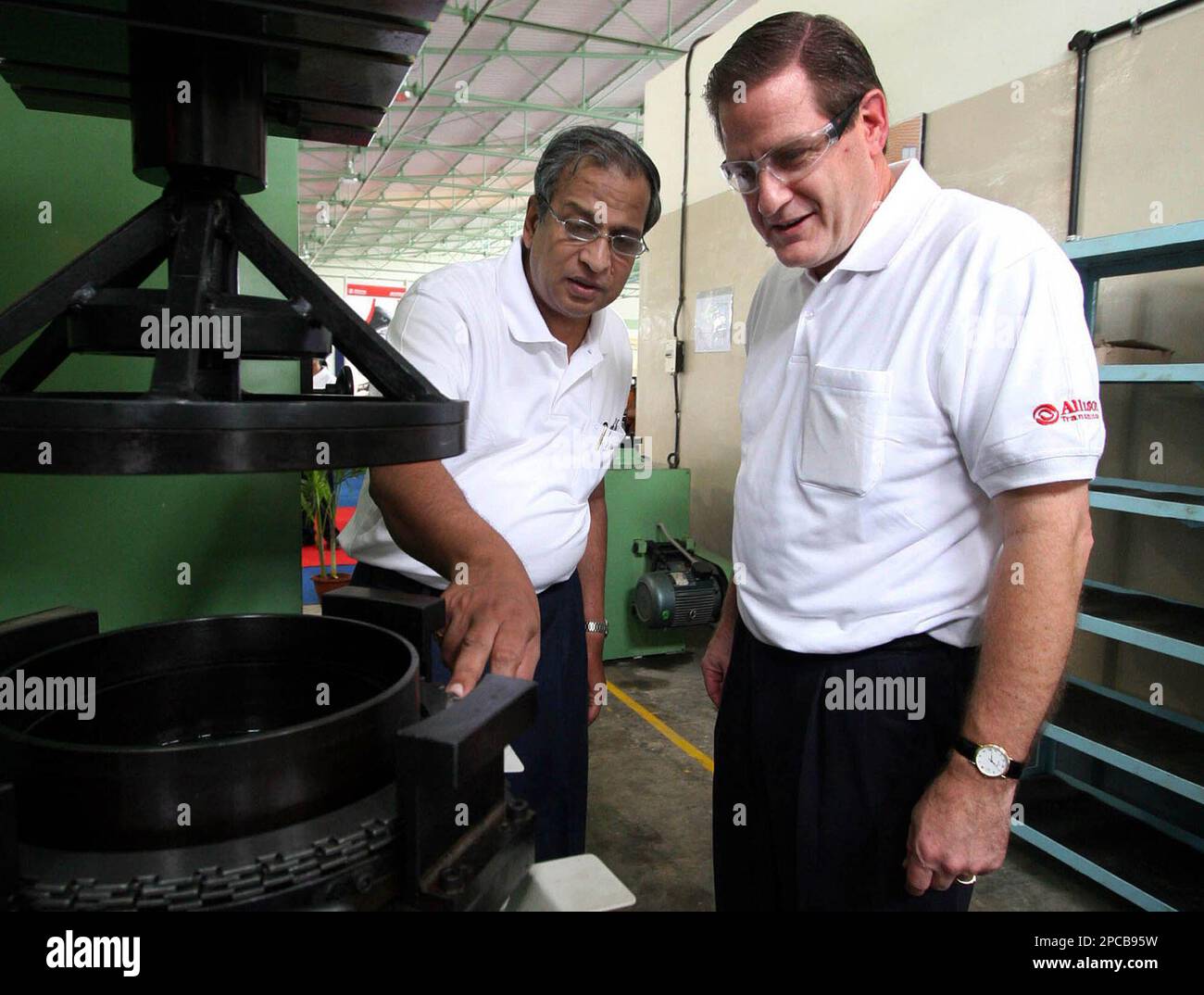 Lawrence E. Dewey, right, President of Allison Transmission, US, looks