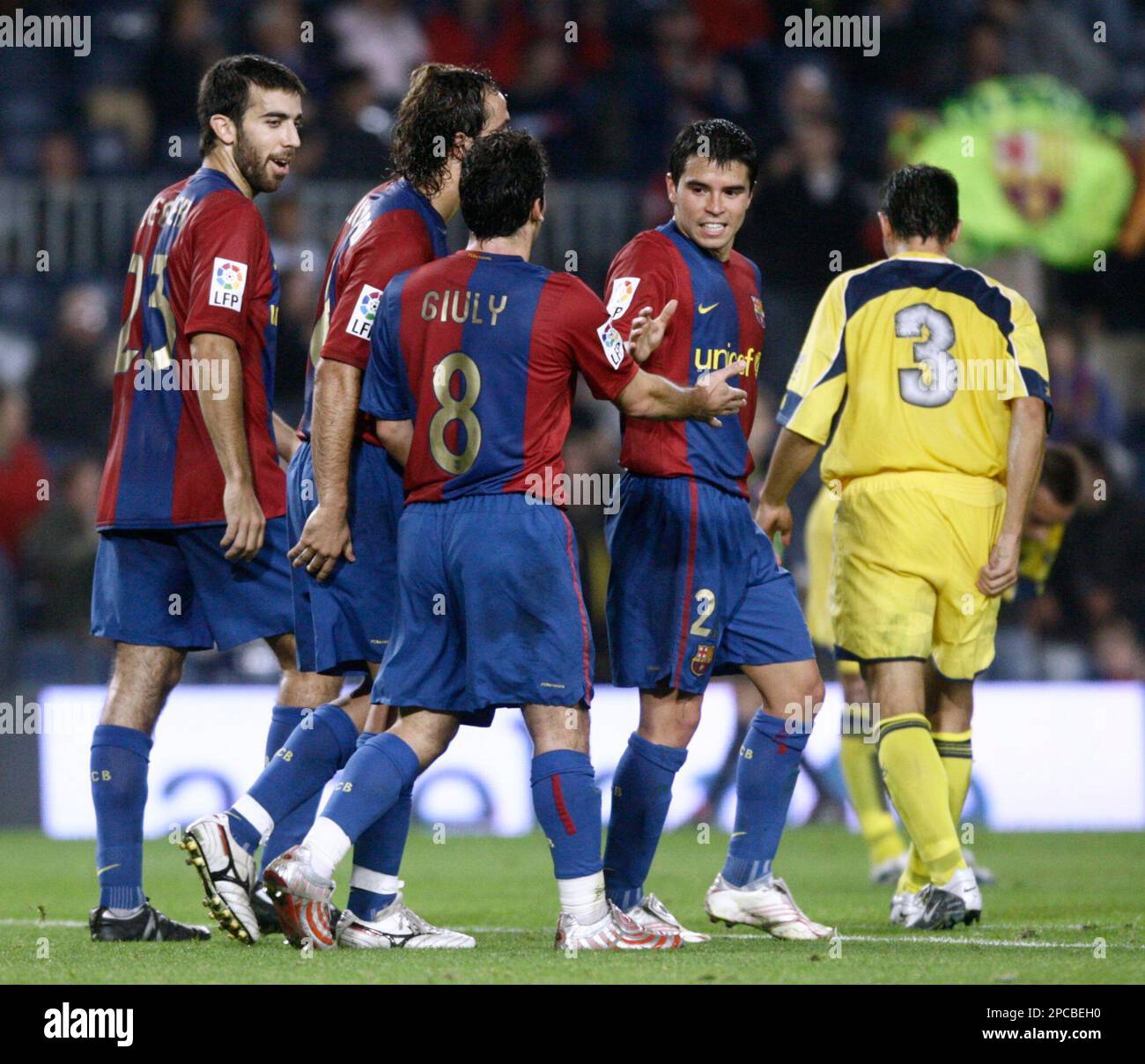 FC Barcelona player Javier Saviola, center, celebrates his goal
