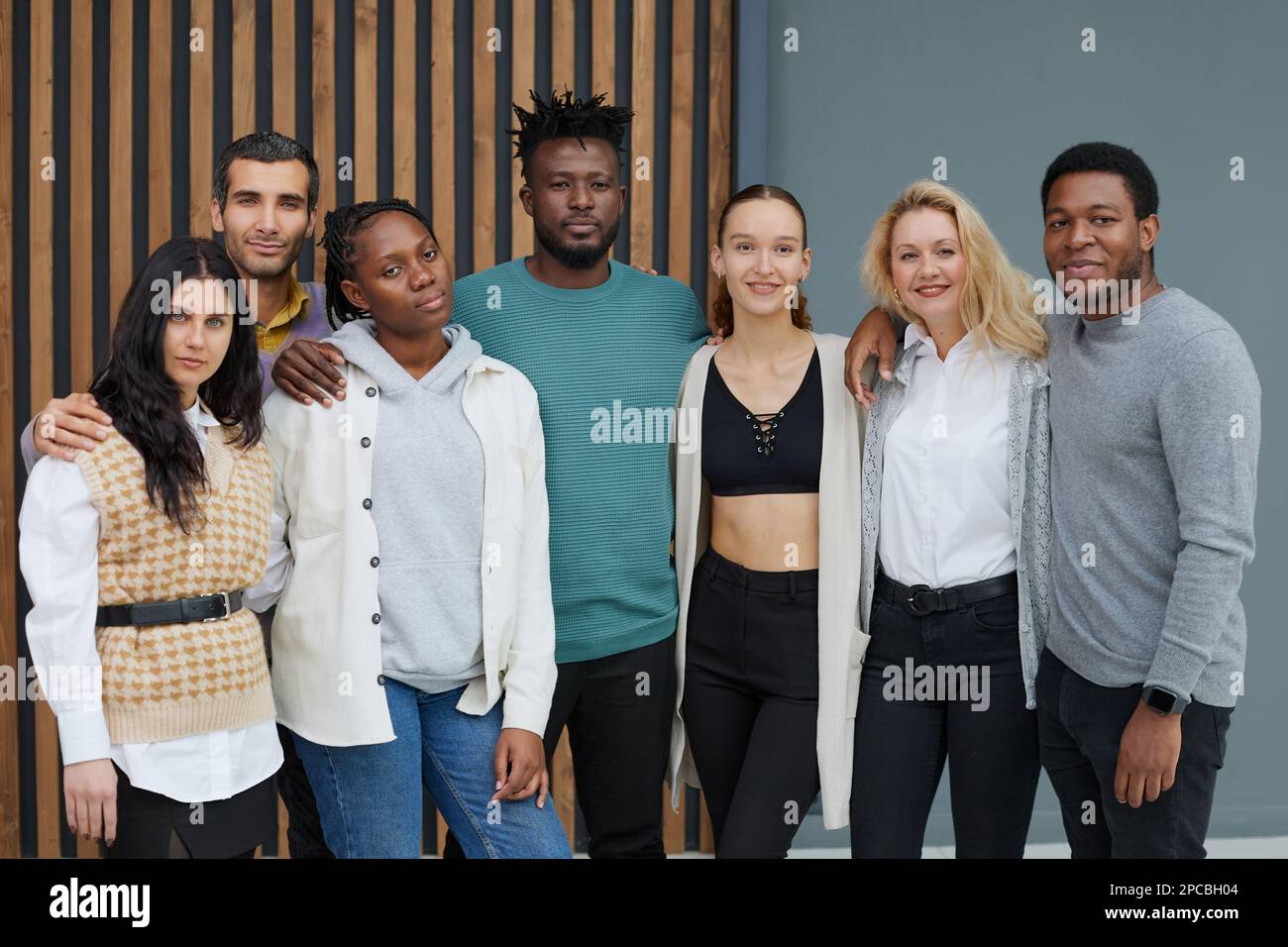 Group of business people standing of a modern office Stock Photo - Alamy