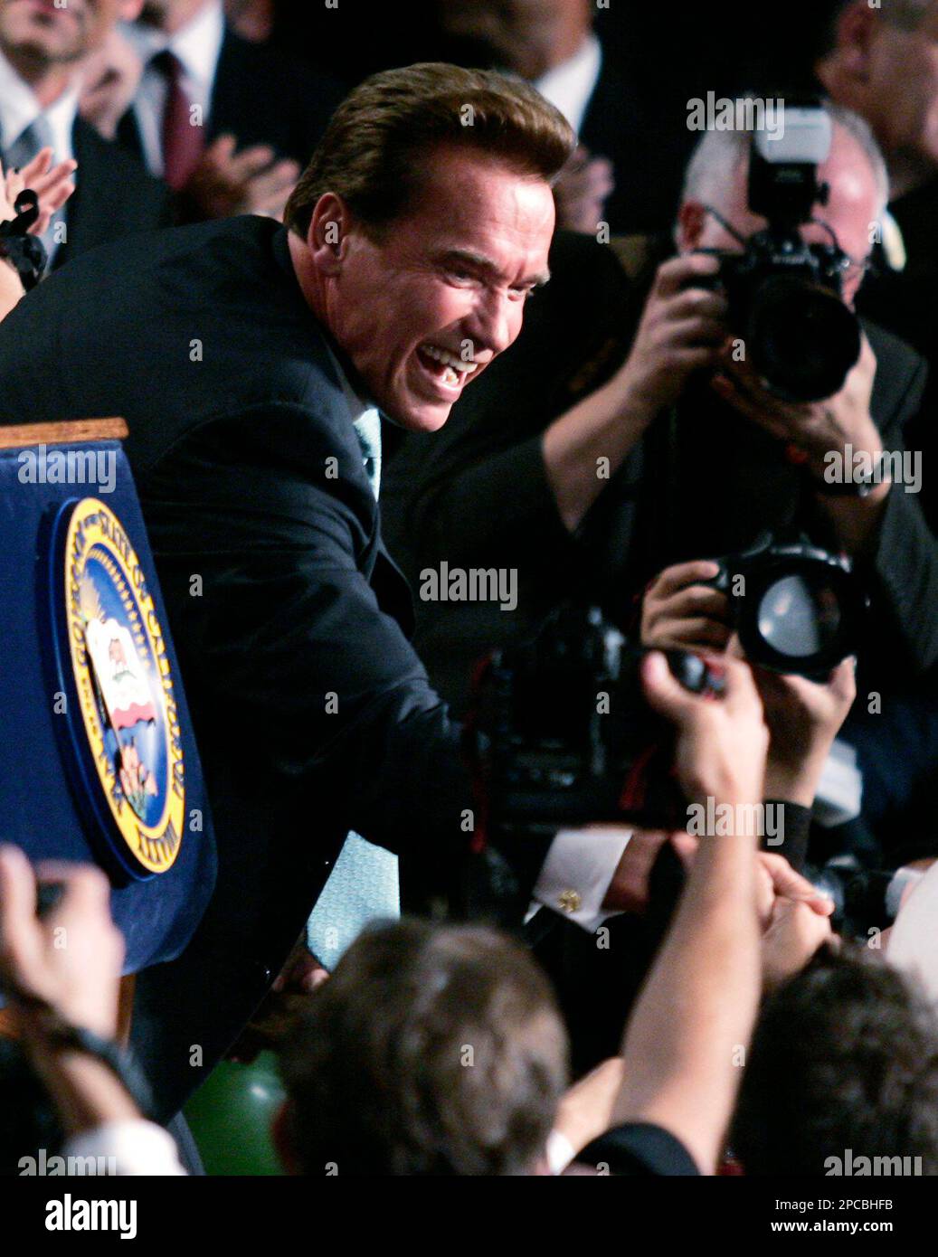 California Gov. Arnold Schwarzenegger greets supporters Tuesday, Nov. 7