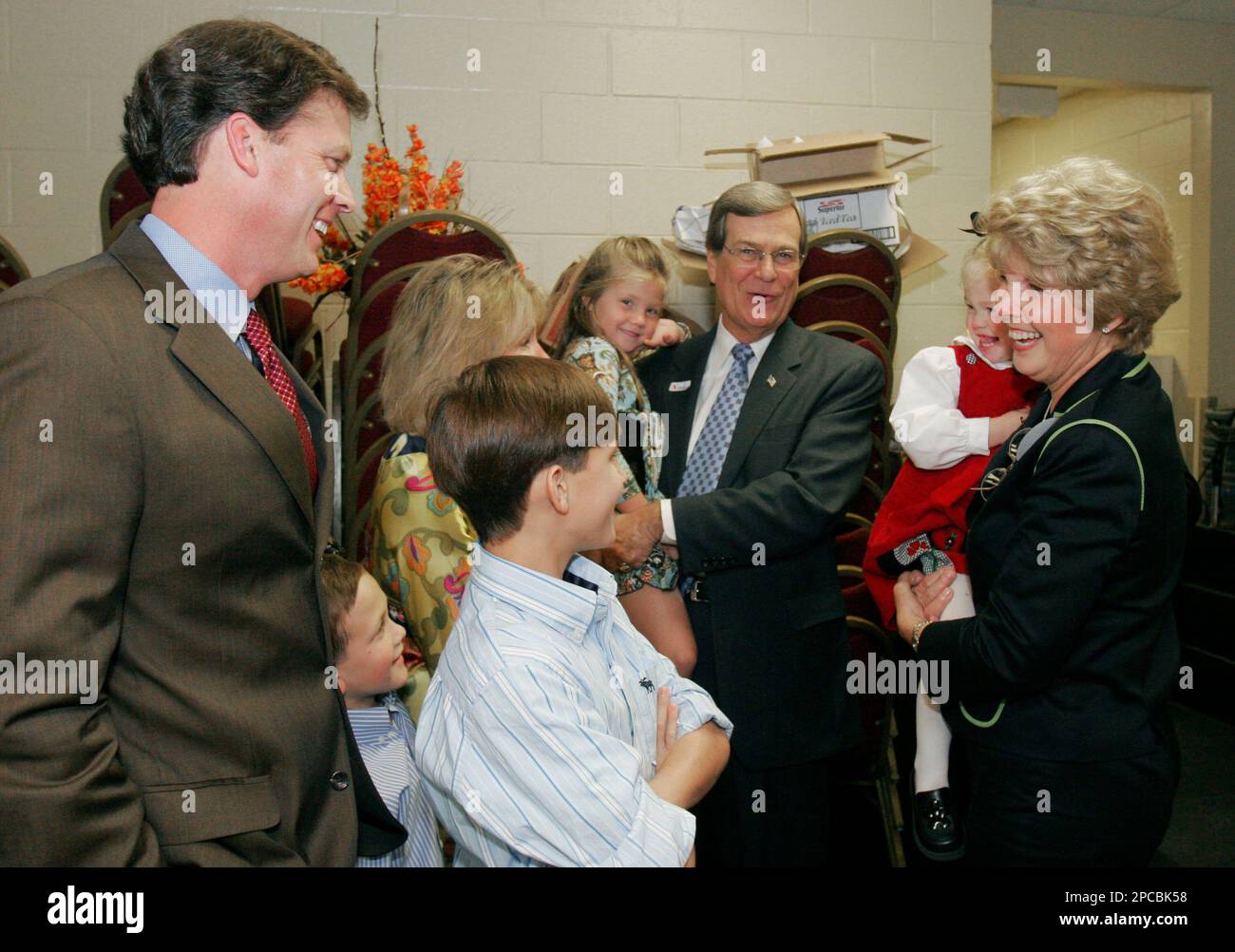 U.S. Sen. Trent Lott, R-Miss., center, his wife Tricia, right, and ...