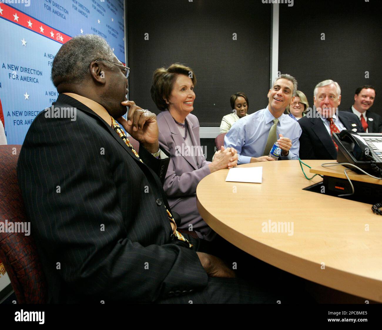 House Minority Leader Nancy Pelosi, D-Calif. watches election returns at the Democratic Congressional Campaign Committee headquarters in Washington Tuesday, Nov. 7, 2006. With her, left to right, are Rep. Jim Clyburn, D-S.C., Rep. Rahm Emanuel, D-Ill., and Rep. Steny Hoyer, D-Md. (AP Photo/Gerald Herbert) Stock Photo