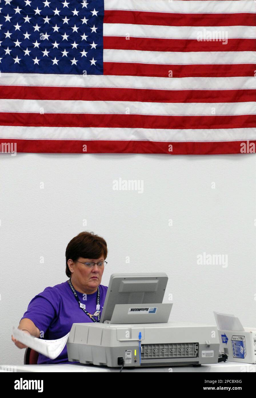 Paula Keller, director of election services for Crawford County, Kansas,  sets up automated ballot marking machines for people with disabilities  Monday, Nov. 6, 2006, at St. John Lutheran Church in preparation for