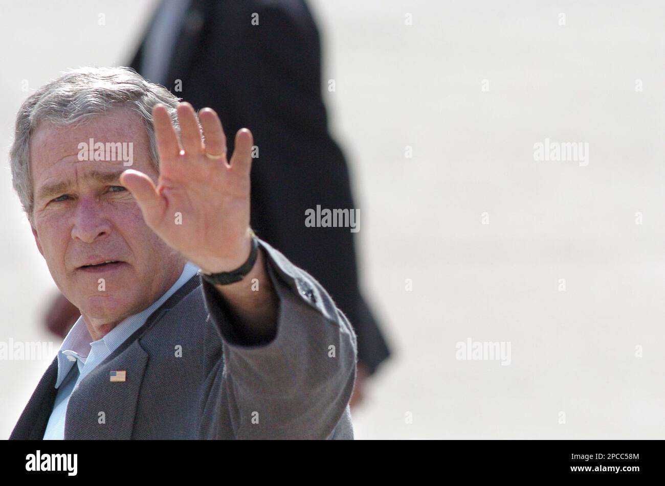 President George Bush waves as he departs Buckley Air force Base, in ...