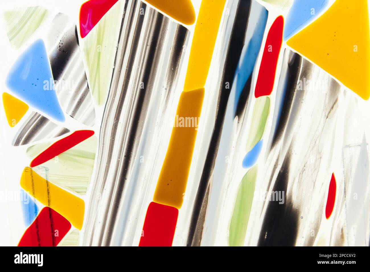 Colorful palette of fused glass. Glass fusing is the joining together
