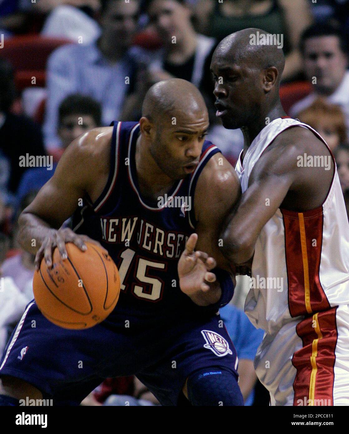 New Jersey Nets forward Vince Carter slams home a dunk against the Utah  Jazz during the second half Saturday, January 29, 2005,in Salt Lake City.  (AP Photo/Steve C. Wilson Stock Photo 