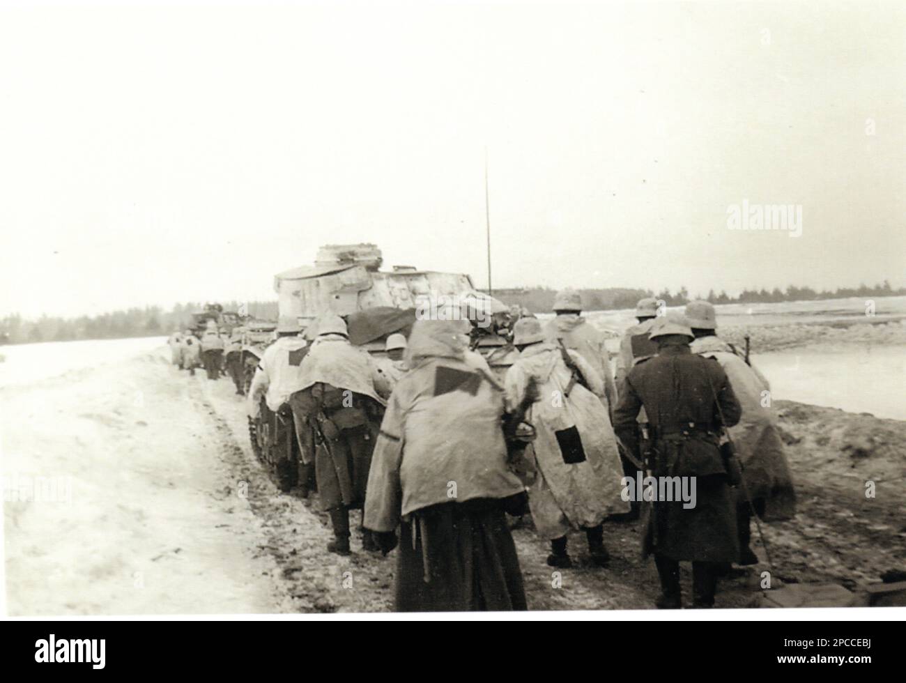 World War Two B&W photo German Troops and Tank advance on the Russian Front during the Winter of 1941/42 Stock Photo