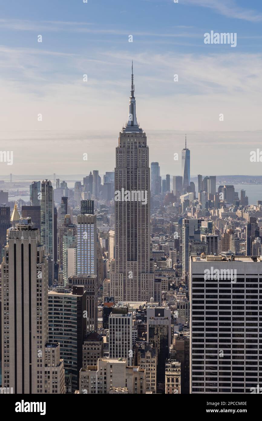 view of Empire State Building and skyline in midtown Manhattan in New ...