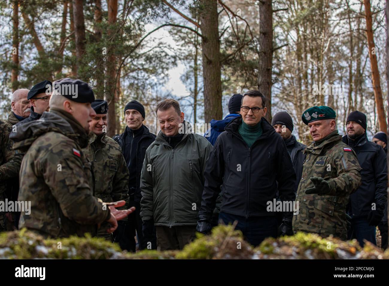 Warsaw, Poland. 12th Mar, 2023. Prime Minister of Poland, Mateusz Morawiecki, 2nd right, and Minister of National Defense, Mariusz Błaszczak, center, observe survival tactic demonstrations during the Train with NATO event, March 12, 2023 in Warsaw, Poland. Credit: Sgt. Lianne Hirano/U.S Army/Alamy Live News Stock Photo