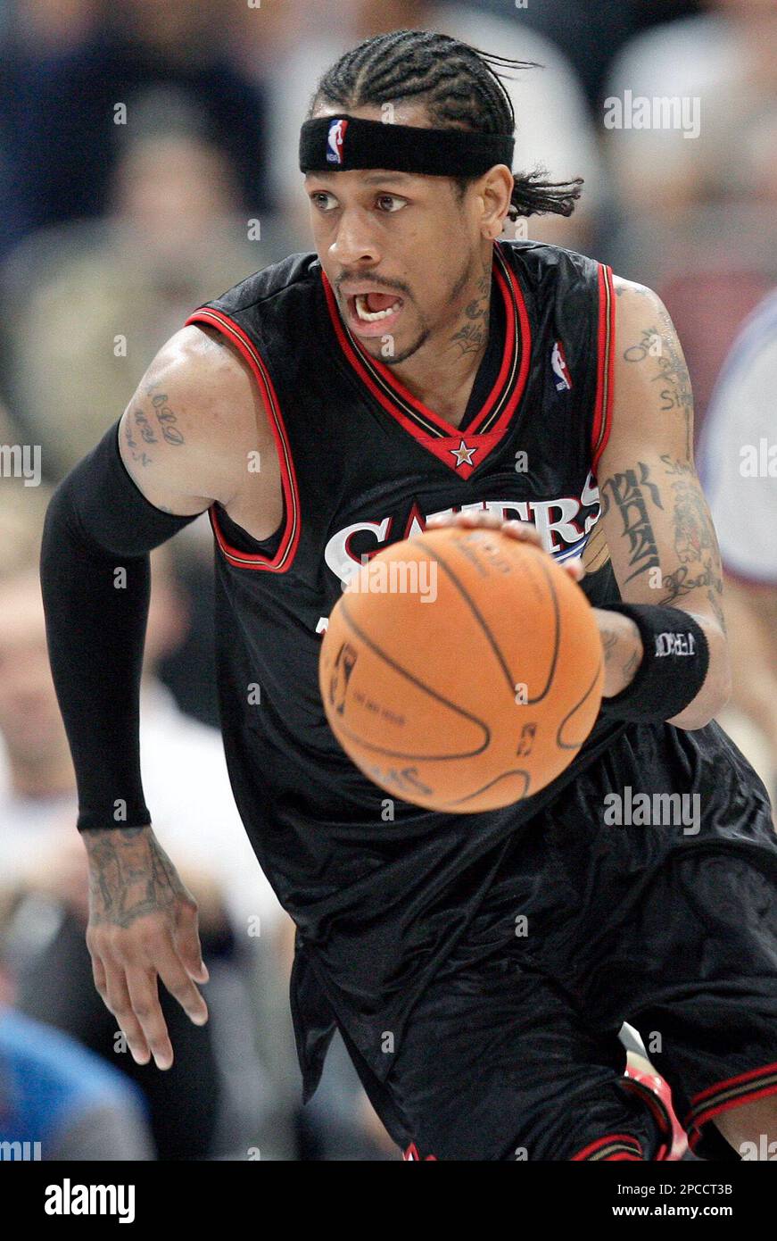 FILE ** Philadelphia 76ers Allen Iverson plays the ball during an NBA Live Tour basketball match against the Phoenix Suns at the Koeln Arena in Cologne, Germany, Oct