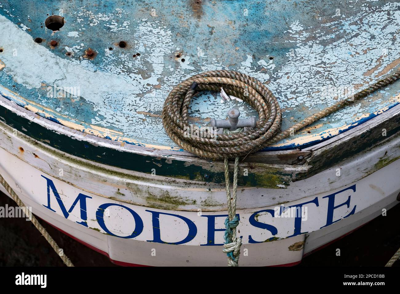 The aged bow of an old fishing boat in Scarborough harbour Stock Photo