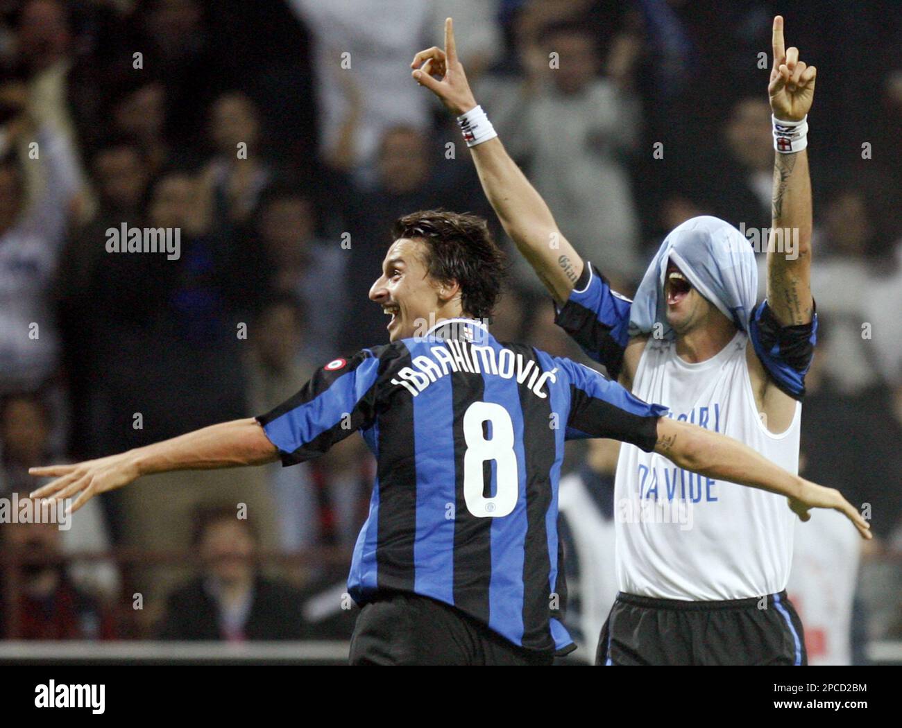 Materazzi celebrates with Ibrahimovic after scoring against AC Milan