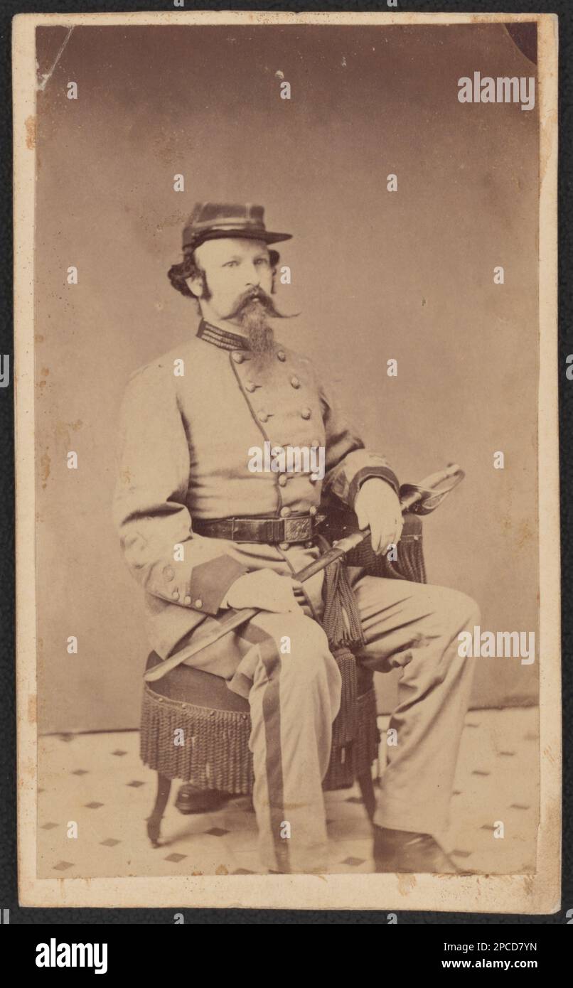 Unidentified soldier in Confederate uniform with sword. Liljenquist Family Collection of Civil War Photographs , pp/liljpaper. Confederate States of America, Army, People, 1860-1870, Soldiers, Confederate, 1860-1870, Military uniforms, Confederate, 1860-1870, Daggers & swords, 1860-1870, United States, History, Civil War, 1861-1865, Military personnel, Confederate. Stock Photo