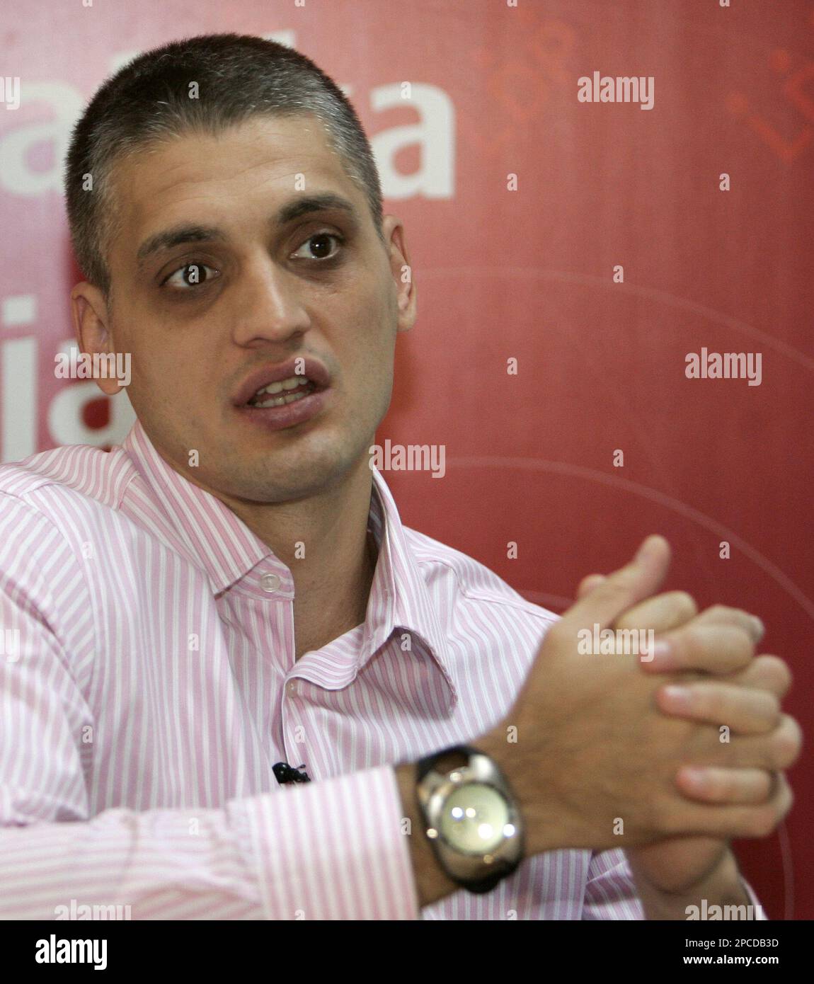 Cedomir Jovanovic, the leader of the Liberal Democratic Party gestures during an interview with The Associated Press, in Belgrade, Wednesday, Oct. 25, 2006. Jovanovic says "We have to accept the reality, Jovanovic says, "and the reality is that Kosovo has been independent from Belgrade since 1999" when a NATO air war forced Serbia to relinquish control over the region to a U.N. administration. (AP Photo/Darko Vojinovic) Stock Photo