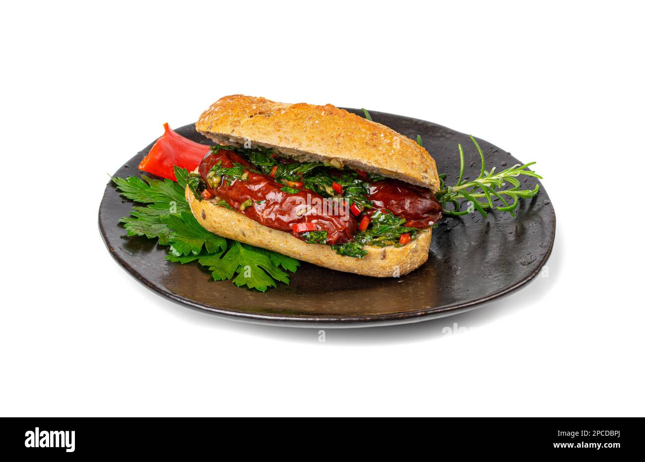 Choripan Sausage Sandwich Isolated, Traditional Chimichurri Bread with Chorizo and Chimichurri, South American Street Food, Choripan Sausage Sandwich Stock Photo