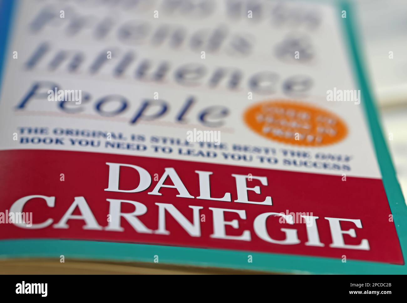 Viersen, Germany - March 9. 2023: Closeup of book cover How to win friends and influence people by Dale Carnegie 1936 Stock Photo