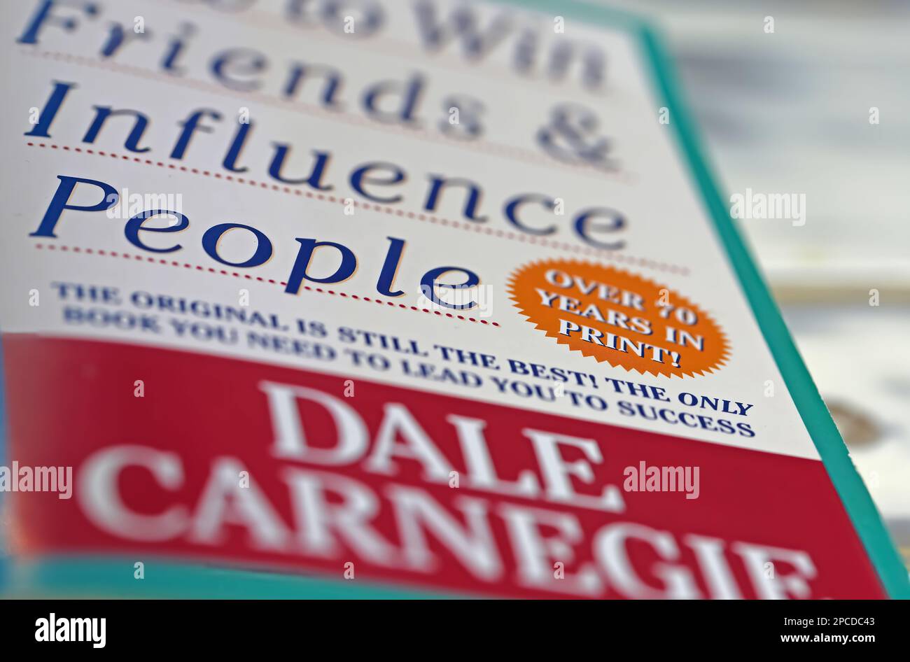 Viersen, Germany - March 9. 2023: Closeup of book cover How to win friends and influence people by Dale Carnegie 1936 Stock Photo