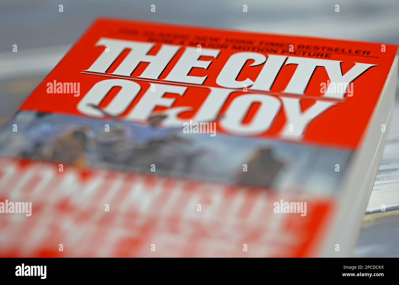 Viersen, Germany - March 9. 2023: Closeup of book cover the City of joy by Dominique Lapierre Stock Photo