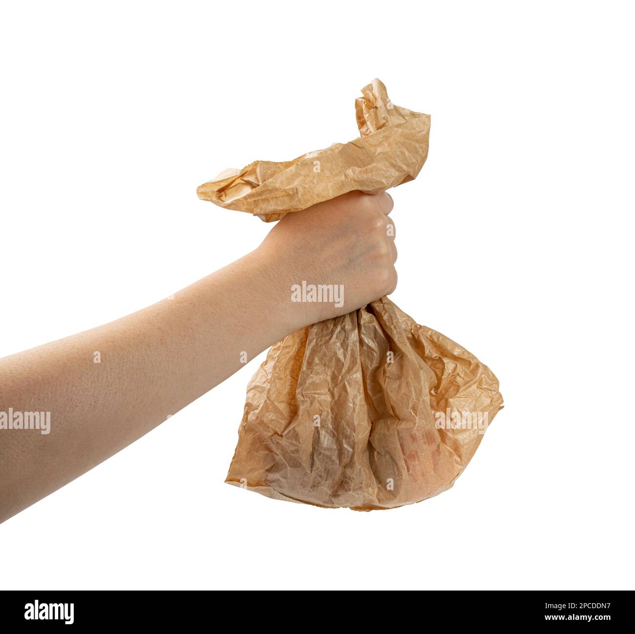 Old paper bag in hand isolated. Crumpled disposable ecology container